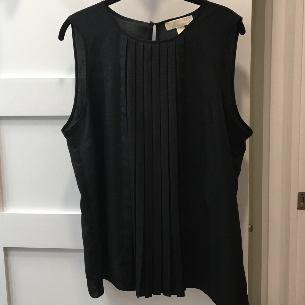 Sleeveless flutter blouse